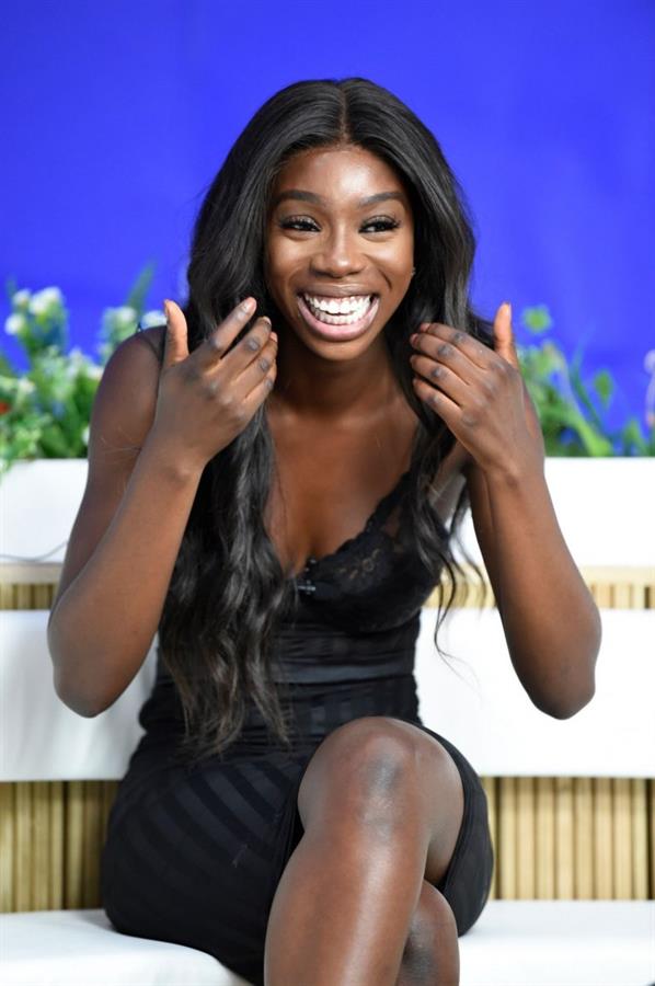 Yewande Biala from Love Island sexy in a tight black dress on  I Saw It First HQ .















