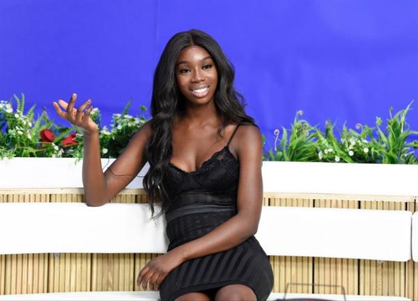 Yewande Biala from Love Island sexy in a tight black dress on  I Saw It First HQ .















