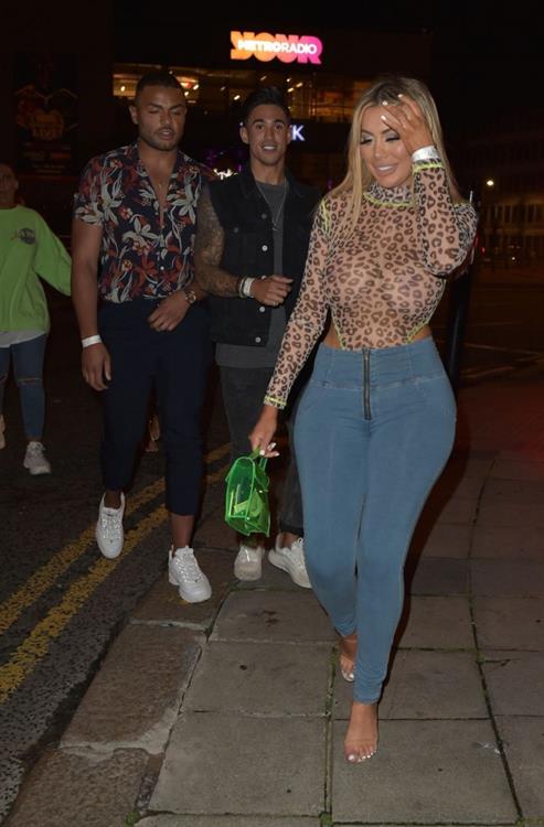 Chloe Ferry braless boobs in a see through top seen by paparazzi showing off her tits and ass.





