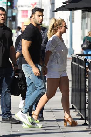 Britney Spears braless boobs in a see through blouse showing her nipples seen by paparazzi.


