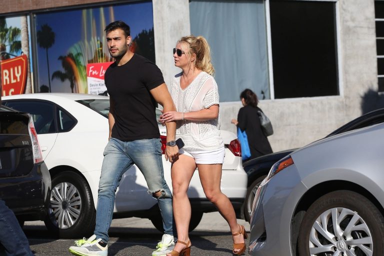 Britney Spears Pictures Britney Spears braless boobs in a see through blouse showing her nipples seen by paparazzi.