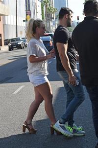 Britney Spears braless boobs in a see through blouse showing her nipples seen by paparazzi.


