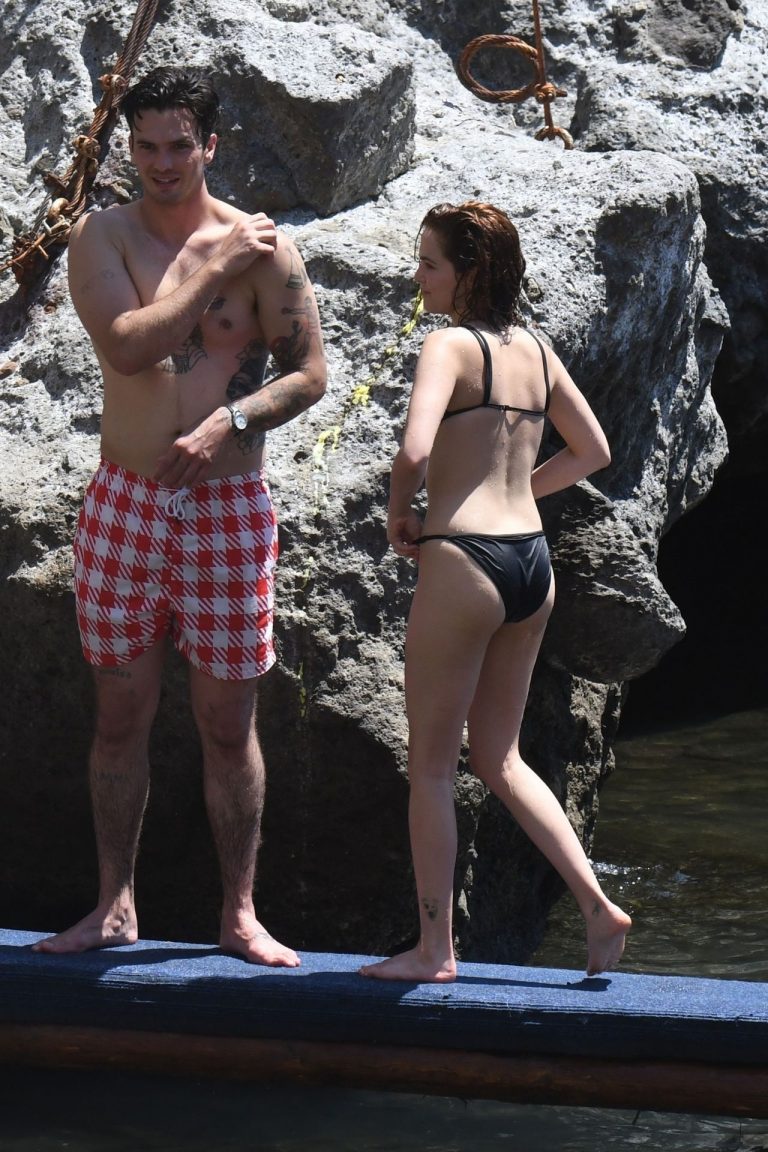 Zoey Deutch sexy boobs and ass in a little bikini in the water seen by  paparazzi. Unrated