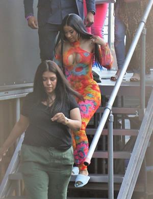 Cardi B boobs and booty on display on and off stage showing nice cleavage and her sexy ass in a tight dress.























