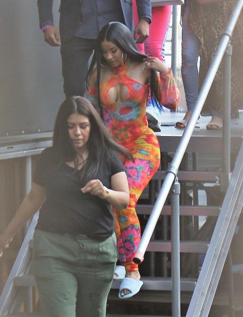 Cardi B boobs and booty on display on and off stage showing nice cleavage and her sexy ass in a tight dress.























