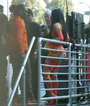 Cardi B boobs and booty on display on and off stage showing nice cleavage and her sexy ass in a tight dress.























