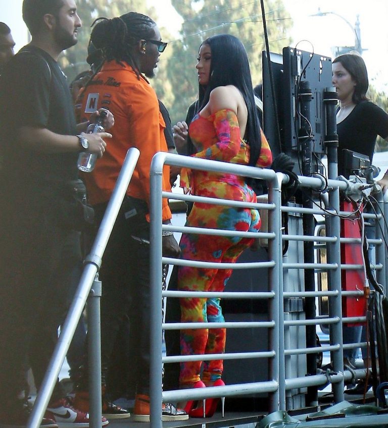 Cardi B boobs and booty on display on and off stage showing nice cleavage and her sexy ass in a tight dress.























