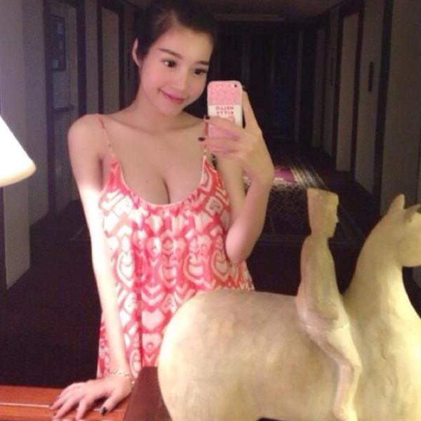 Elly Tran Ha taking a selfie