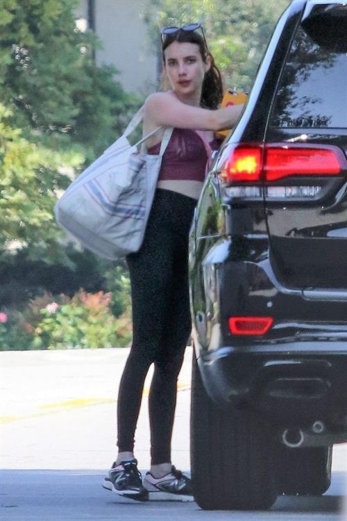 Emma Roberts Pictures Emma Roberts sexy little ass and thigh gap in tight pants seen by paparazzi with Garrett Hedlund.