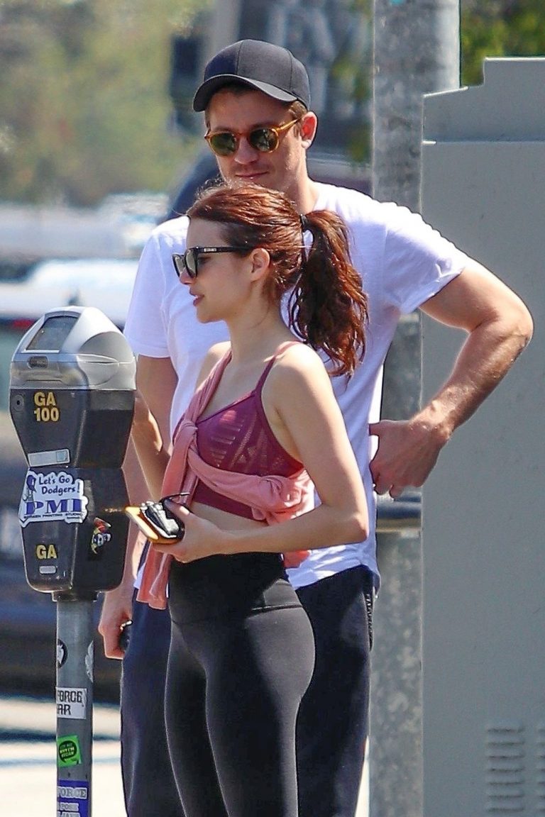 Emma Roberts Pictures Emma Roberts sexy little ass and thigh gap in tight pants seen by paparazzi with Garrett Hedlund.