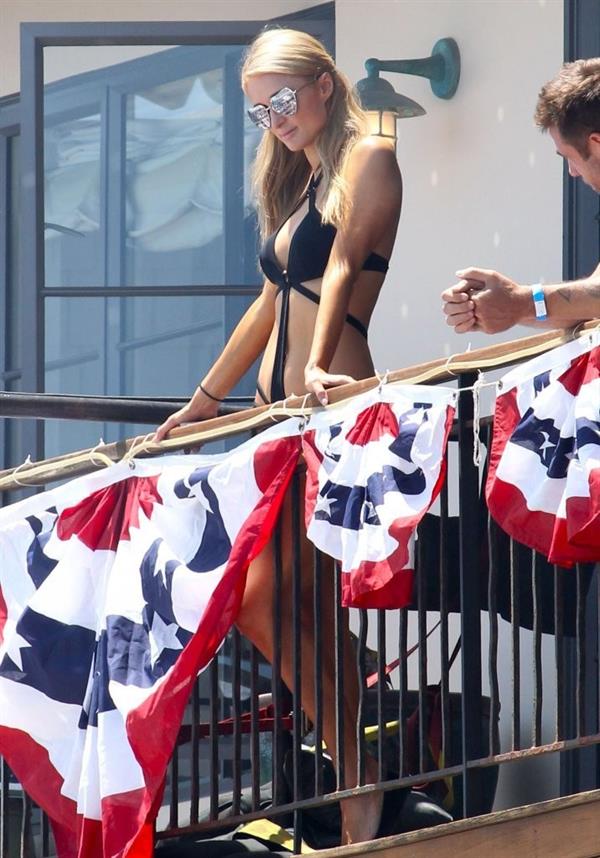 Paris Hilton on a balcony