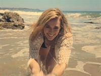 Hilary Duff on a beach