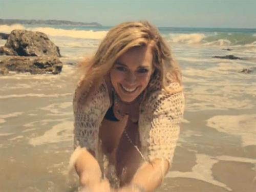 Hilary Duff on a beach