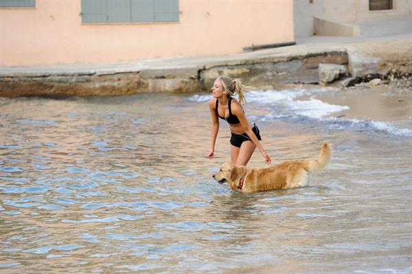 Kimberley Garner at the beach with her dog