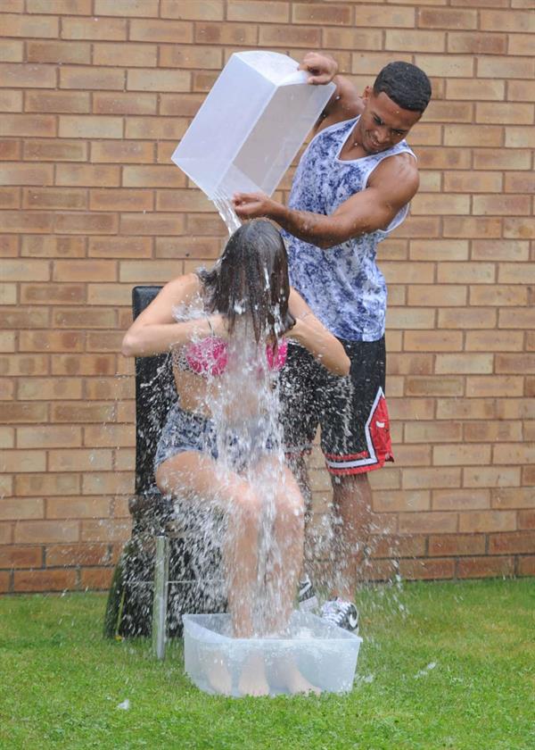 Chloe Goodman gets water dumped on her