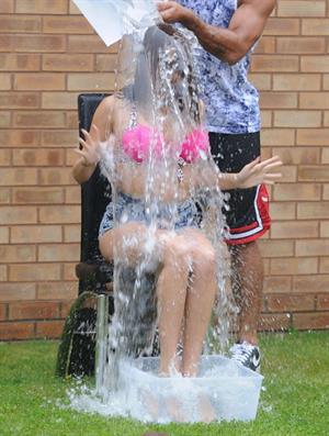 Chloe Goodman gets water dumped on her