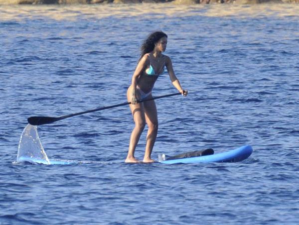 Rihanna paddle boarding