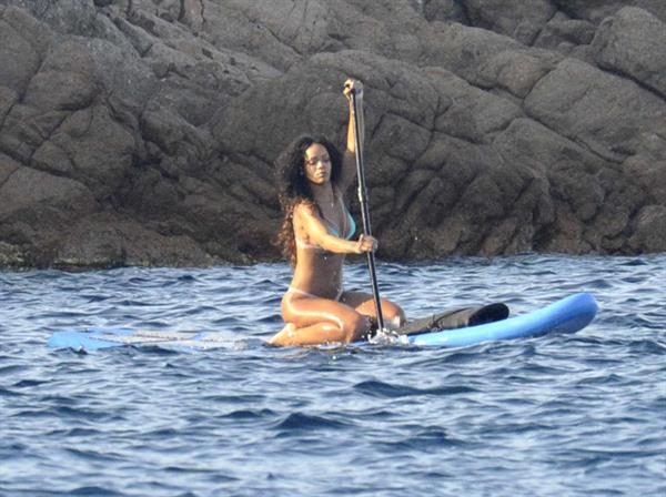 Rihanna paddle boarding