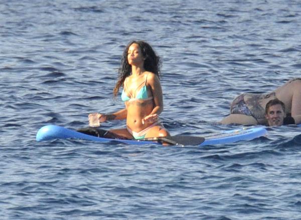 Rihanna paddle boarding