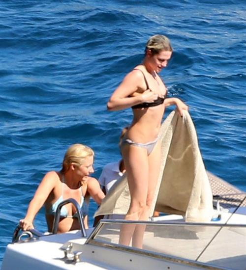 Kristen Stewart Bikini Pictures Kristen Stewart and Stella Maxwell sexy lesbians making out on a boat in bikinis seen by paparazzi.