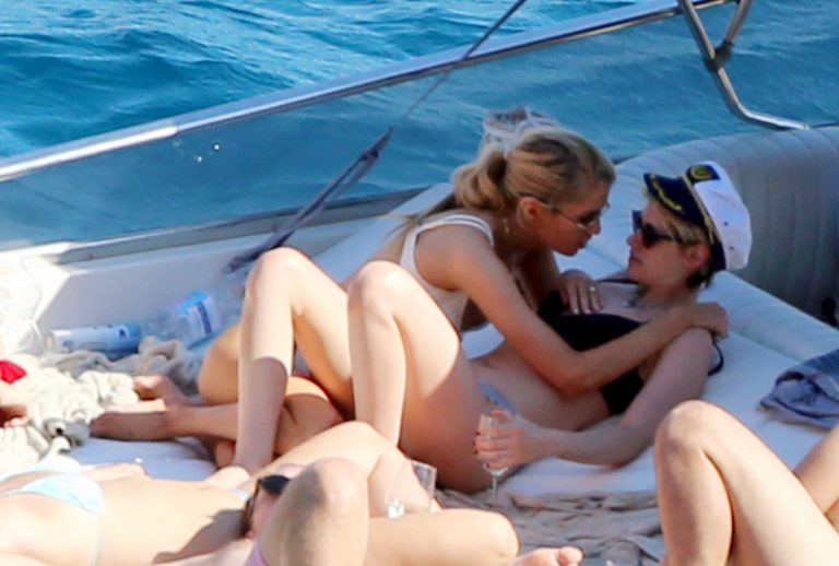 Kristen Stewart Bikini Pictures Kristen Stewart and Stella Maxwell sexy lesbians making out on a boat in bikinis seen by paparazzi.