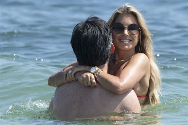 Sylvie Meis sexy ass in a bikini at the beach with her new boyfriend at the beach seen by paparazzi.















