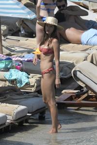 Alessandra Ambrosio perfect model body in a sexy little thong bikini seen at the beach by paparazzi showing nice cleavage and ass.





















