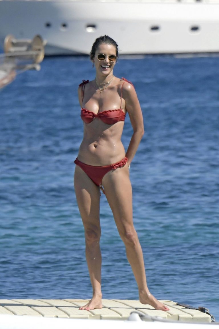 Alessandra Ambrosio Bikini Pictures Alessandra Ambrosio perfect model body in a sexy little thong bikini seen at the beach by paparazzi showing nice cleavage and ass.