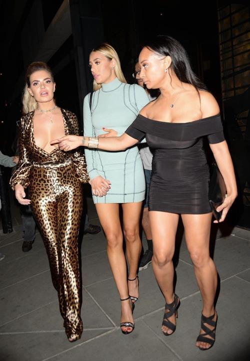 Megan Barton Hanson Pictures Megan Barton Hanson nip slip wardrobe malfunction flashing her tits and Lisa Maffia braless boobs in a see through top seen by paparazzi.