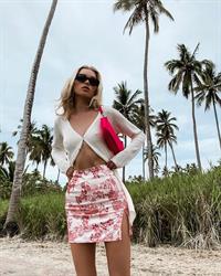 Elsa Hosk braless tits pokies in an open top.















































