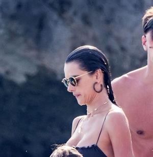 Alessandra Ambrosio sexy at the beach in a thong bikini and flashing her pussy to her boyfriend seen by paparazzi.











