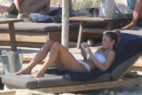 Lorena Rae sexy ass in a white bikini at the beach seen by paparazzi.












