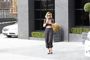 Rhian Sugden big boobs showing nice cleavage seen by paparazzi.
















