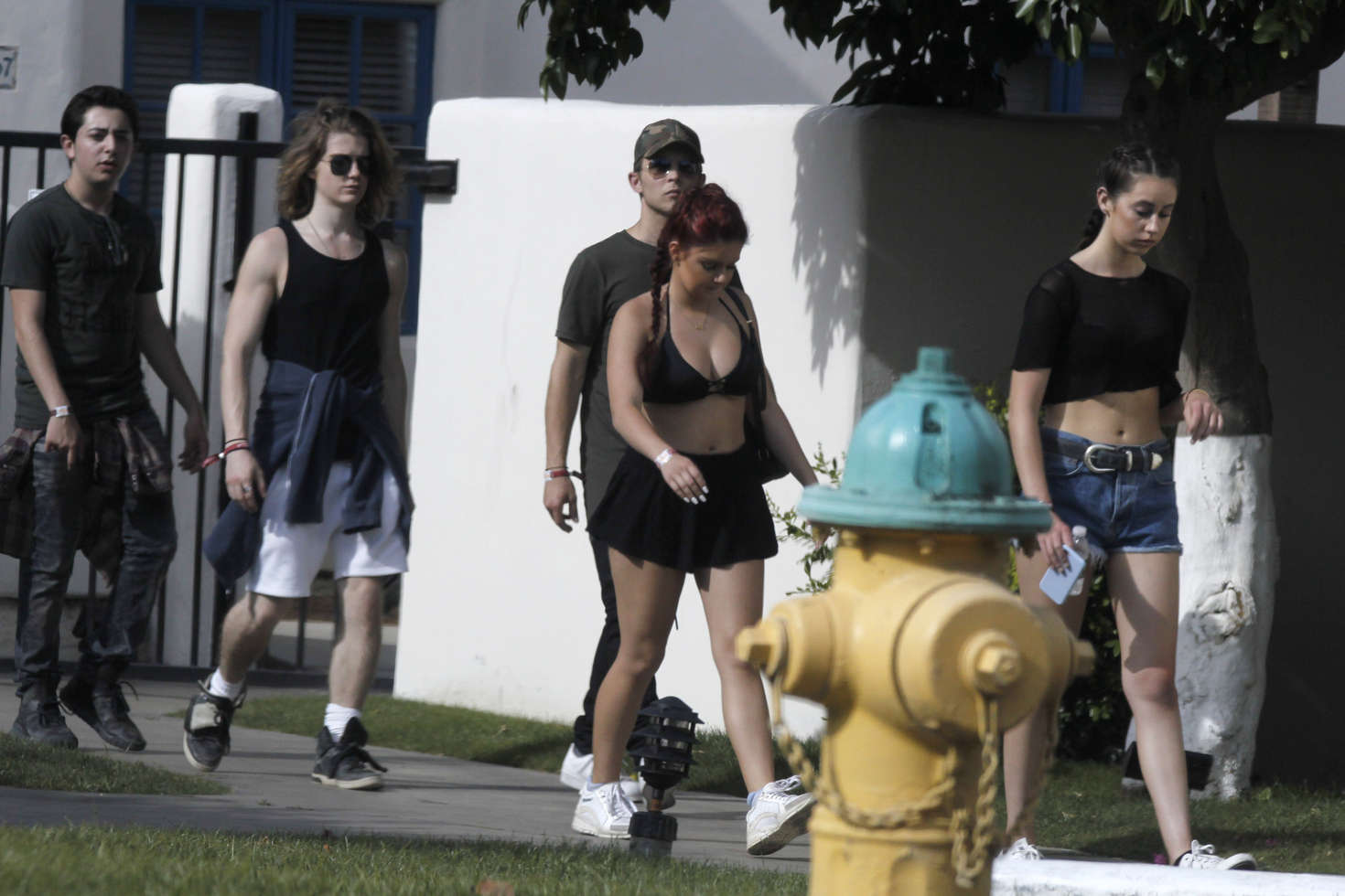 Ariel Winter paparazzi pictures in black bikini top and short skirt