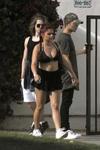 Ariel Winter paparazzi pictures in black bikini top and short skirt