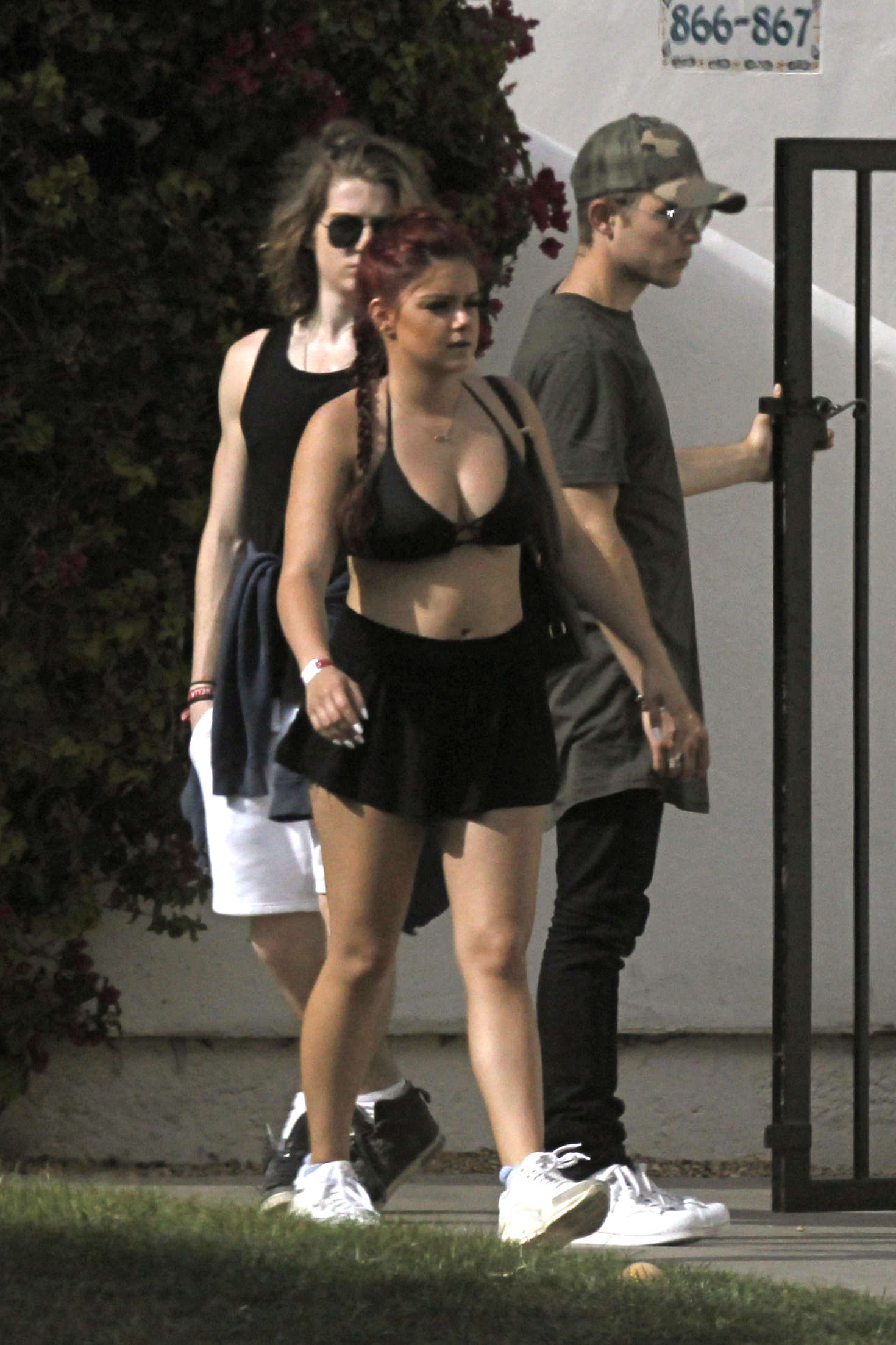 Ariel Winter paparazzi pictures in black bikini top and short skirt