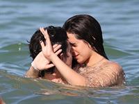 Camila Cabello and Shawn Mendes making out in the water seen by paparazzi kissing.





































