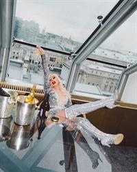 Christina Aguilera showing some nice cleavage with her big tits in a low cut outfit.












