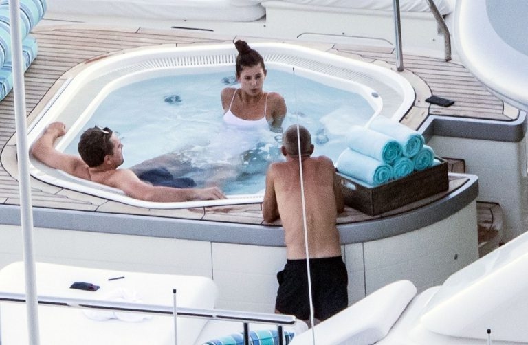 Camila Morrone in a sexy swimsuit in a hot tub on a yacht with Leonardo DiCaprio seen by paparazzi.










