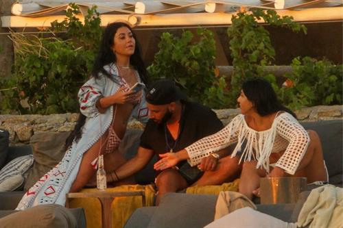 Martha Kalifatidis Bikini Pictures Martha Kalifatidis sexy in a bikini showing her ass and nice cleavage seen by paparazzi.