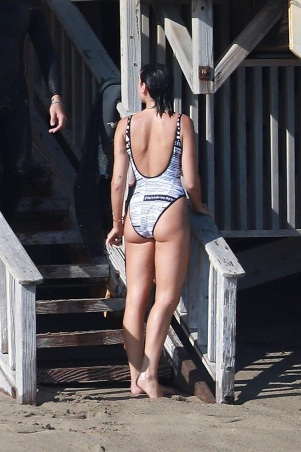 Dua Lipa sexy ass and cleavage in a swimsuit at the beach seen with her boyfriend by paparazzi.













