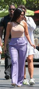Kourtney Kardashian braless boobs in a nude tank top showing off her tits pokies with Kris Jenner seen by paparazzi.














