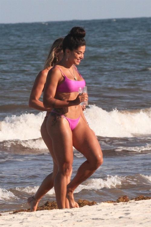 Aline Riscado Bikini Pictures Aline Riscado seen at the beach by paparazzi in a sexy ass thong bikini showing nice cleavage.