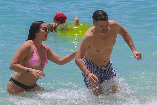 Stassi Schroeder and Katie Maloney-Schwartz sexy at the beach seen by paparazzi in a bikini and a swimsuit showing nice cleavage.