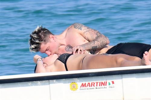 Bella Thorne Bikini Pictures Bella Thorne making out and having fun with her boyfriend in a sexy little bikini seen by paparazzi.