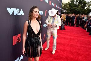 Alison Brie braless boobs showing nice cleavage in a revealing dress on the red carpet at the MTV VMA's.