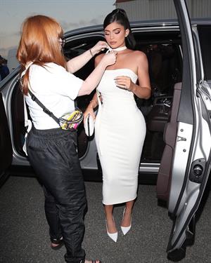 Kylie Jenner sexy ass in a tight white dress with Travis Scott at the premiere of  Look Mom I Can Fly .





































