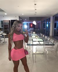 Tammy Hembrow braless boobs showing off her big tits in a tiny see through top and skirt exposing her thong.























































