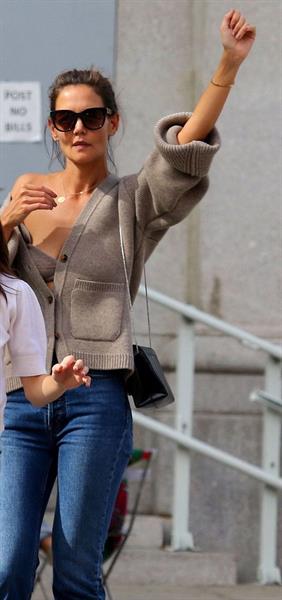 Katie Holmes sexy cleavage seen by paparazzi in a revealing outfit.

