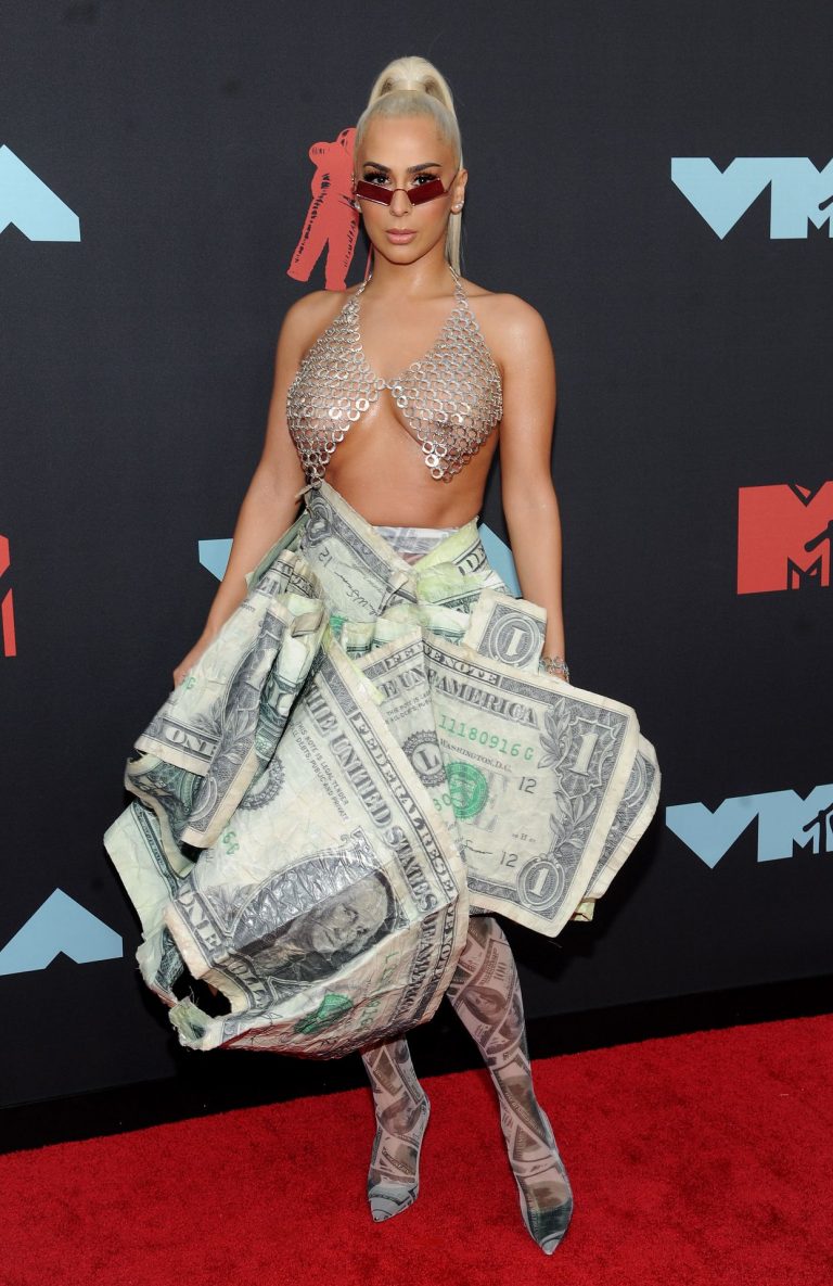 Veronica Vega Pictures Veronica Vega showing off her braless boobs on the red carpet at the MTV VMA's in a see through top.